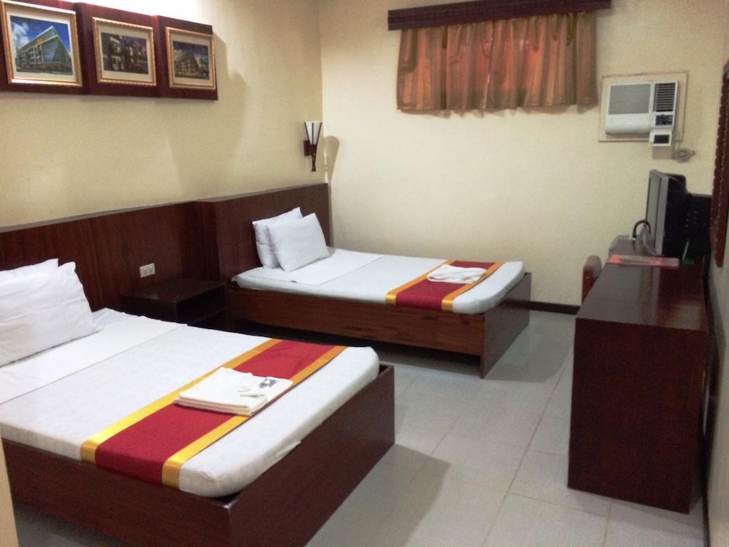 Ysabelle Mansion Bed & Breakfast Puerto Princesa Стая снимка
