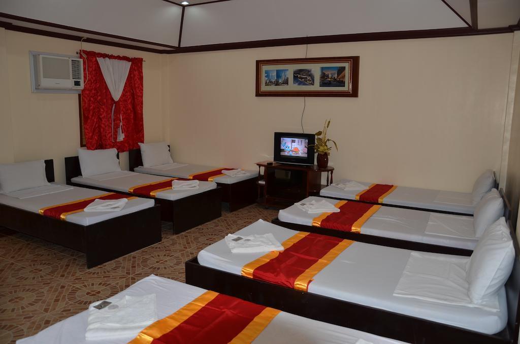 Ysabelle Mansion Bed & Breakfast Puerto Princesa Стая снимка