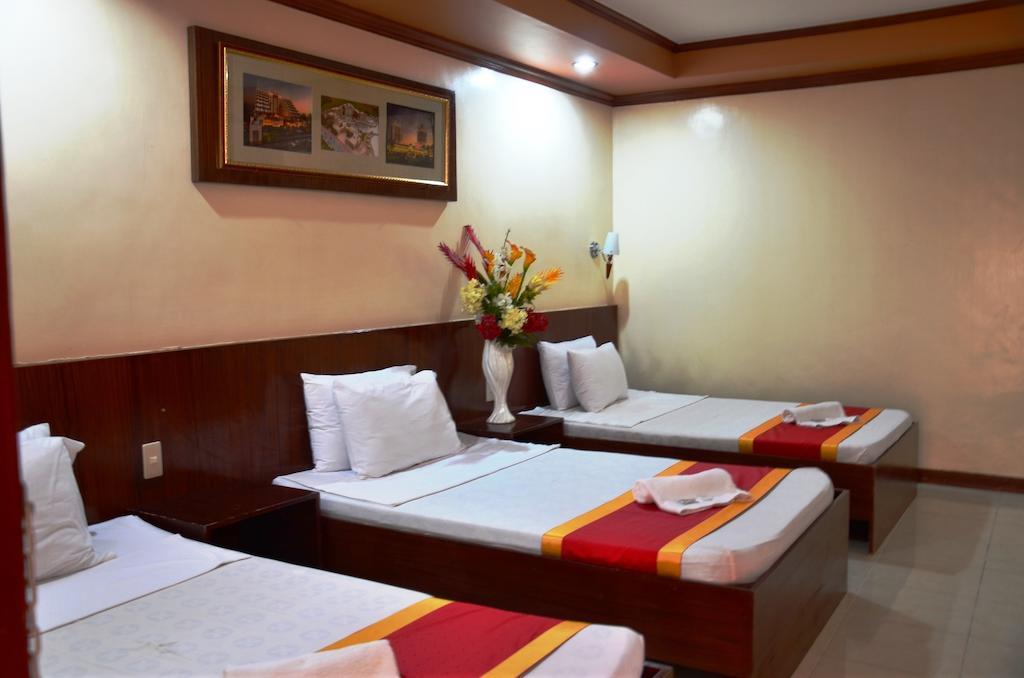 Ysabelle Mansion Bed & Breakfast Puerto Princesa Стая снимка
