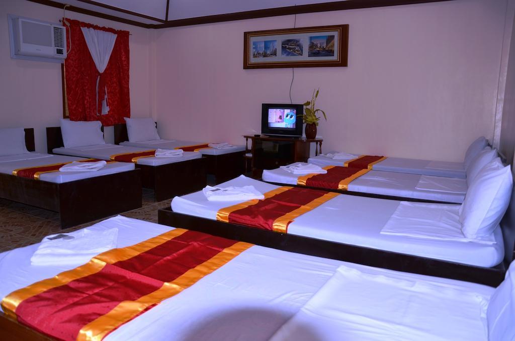 Ysabelle Mansion Bed & Breakfast Puerto Princesa Стая снимка