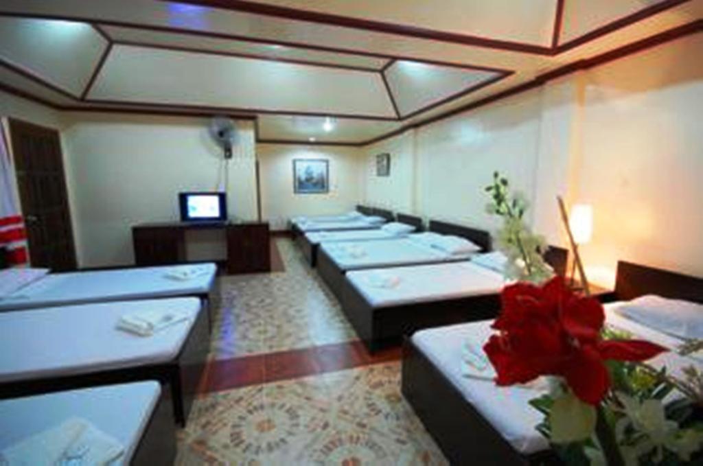 Ysabelle Mansion Bed & Breakfast Puerto Princesa Стая снимка