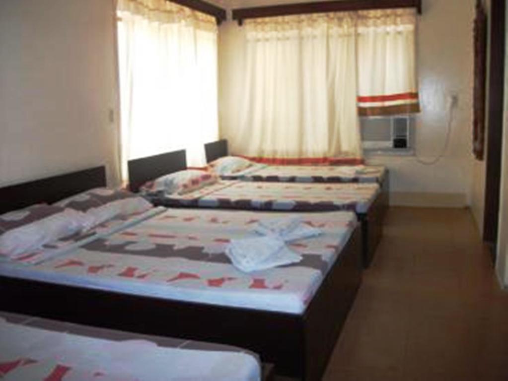 Ysabelle Mansion Bed & Breakfast Puerto Princesa Стая снимка